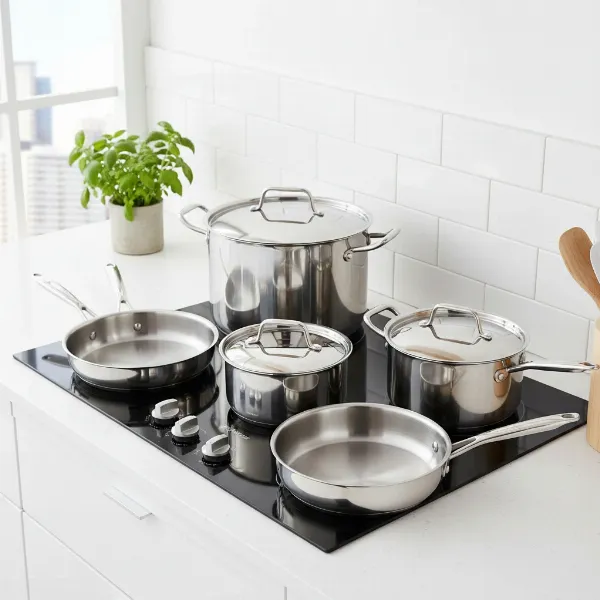 Duxtop Whole-Clad Tri-Ply Stainless Steel Cookware Set on an induction stove