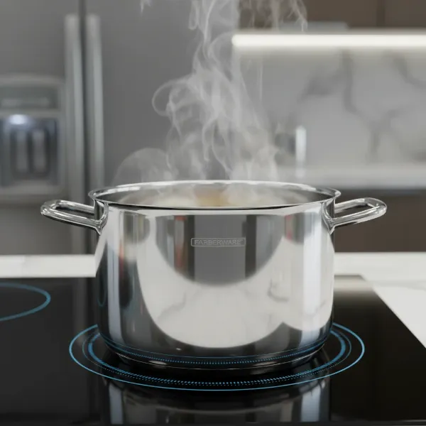 A close-up of a Farberware Millennium stainless steel pot set on an induction hob, illustrating its sturdy construction and polished finish.